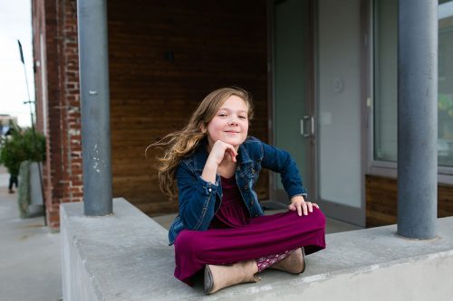 confident girl real personality during relaxed family shoot