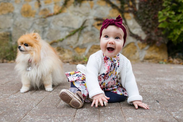 genuinely happy kid with real smile and puppy laid back family pictures