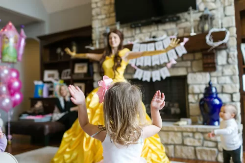 Kansas City birthday party photographer girl dancing with Disney princess Belle photo