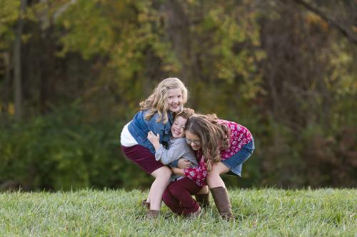 Kansas City children's photographer kids being kids at fun children's photo session