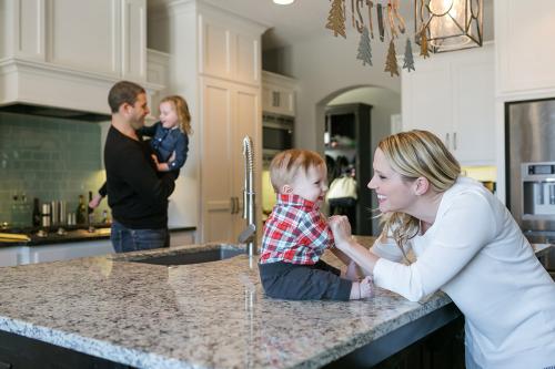 joyful family photo during relaxed in-home family documentary lifestyle photo session