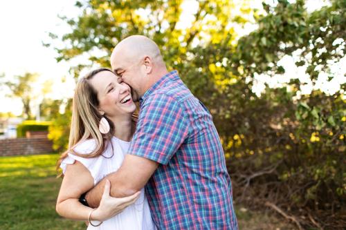 playful photo of couple at photo session in Overland Park