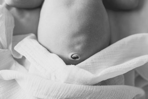 real story newborn session baby tummy and belly button picture