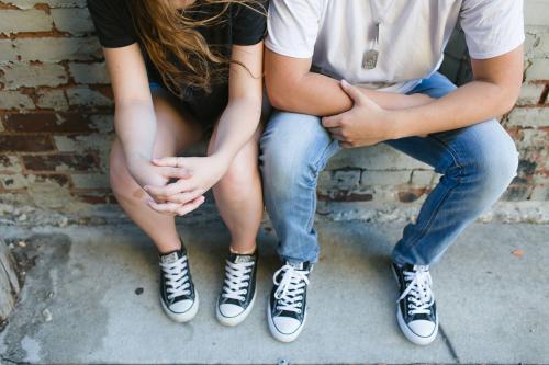 senior boy and girlfriend fun relationship photo with Chucks